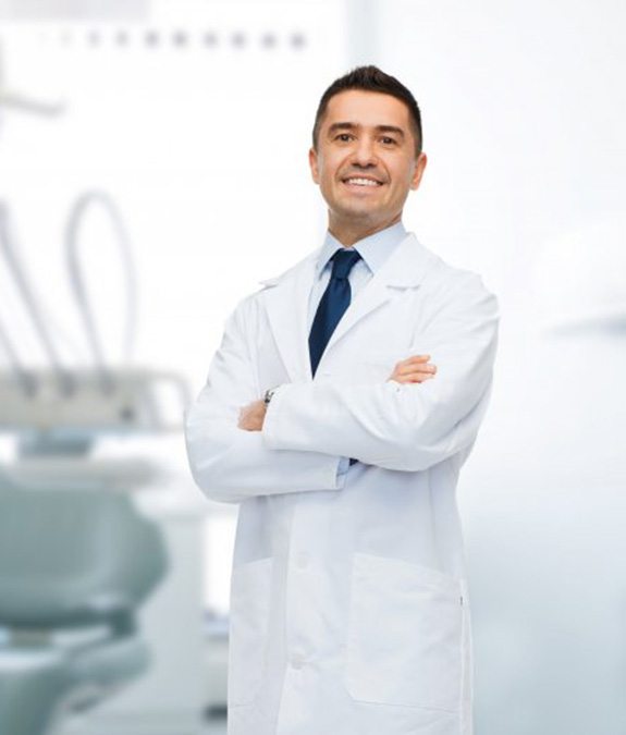 Male dentist smiling