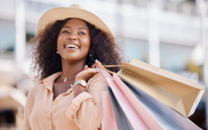 Woman smiling with perfect teeth after a shopping spree