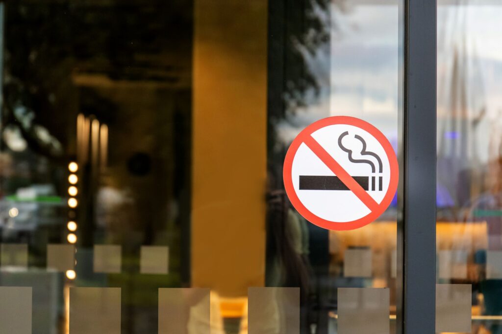 No smoking emblem on sliding glass door